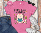 Purr and Unwind cat reading a book T-Shirt