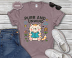 Purr and Unwind cat reading a book T-Shirt