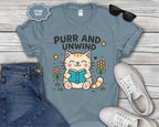 Purr and Unwind cat reading a book T-Shirt