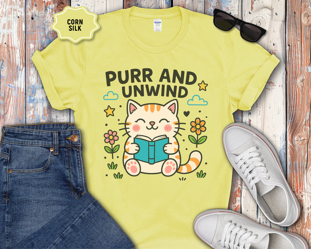 Purr and Unwind cat reading a book T-Shirt