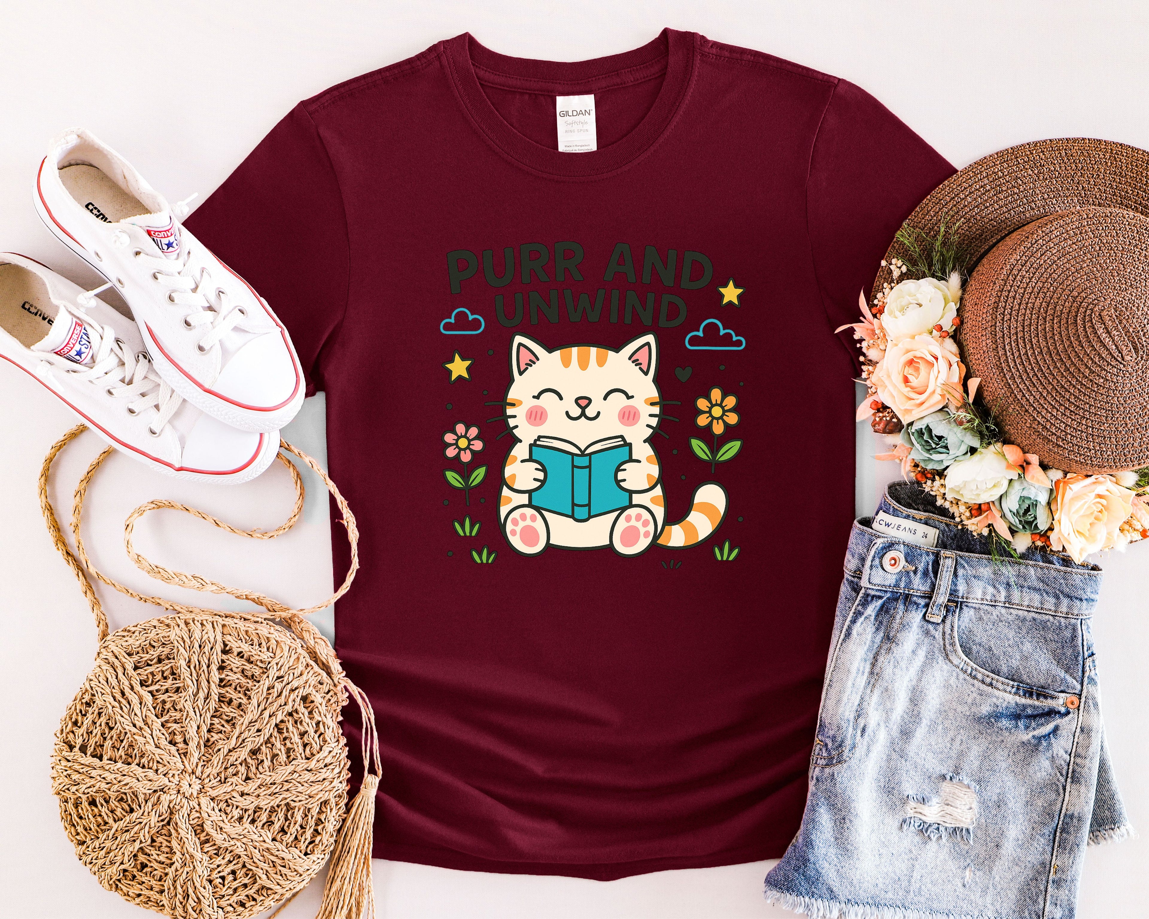 Purr and Unwind cat reading a book T-Shirt
