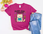 Purr and Unwind cat reading a book T-Shirt
