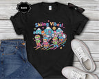 Cute Cartoon Skiers Skiing Vibes T-Shirt