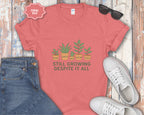 Still Growing Despite It All Potted Plants Illustration T-Shirt