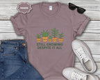 Still Growing Despite It All Potted Plants Illustration T-Shirt